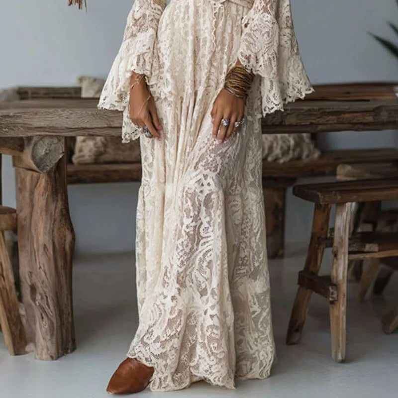 Sophisticated women's long V-neck evening dress featuring flowy flare sleeves, ideal for formal occasions & guests.