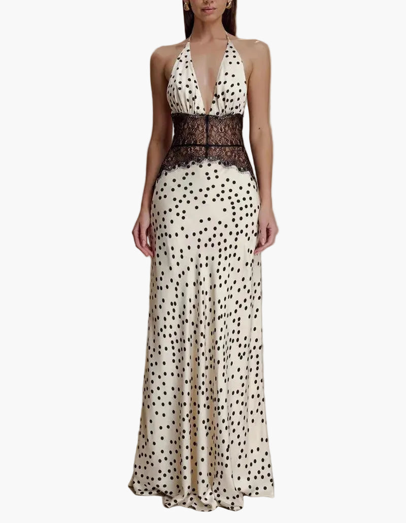 Chic women's halter neck polka dot maxi dress with intricate lace. Perfect elegant summer party fashion.