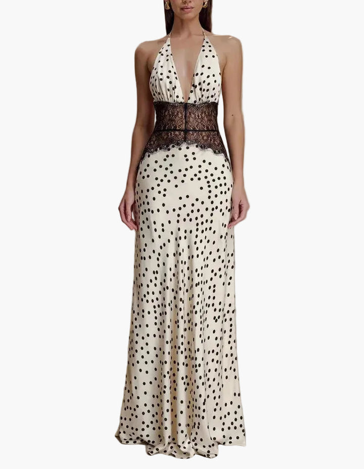 Chic women's halter neck polka dot maxi dress with intricate lace. Perfect elegant summer party fashion.