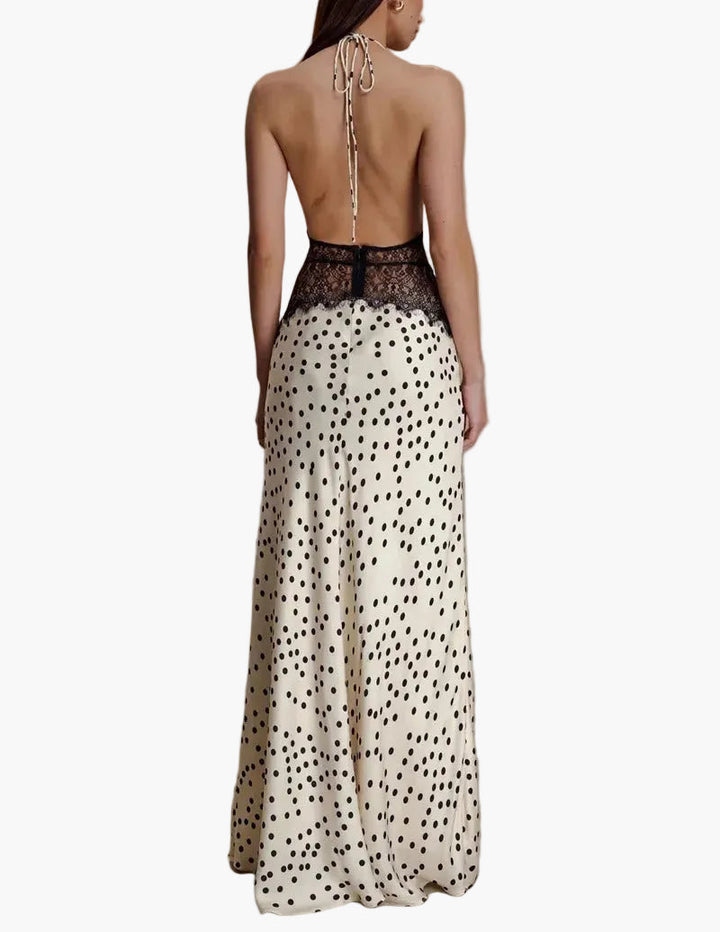 White polka dot halter neck maxi dress for women, featuring delicate lace. Elegant & comfortable for summer parties.