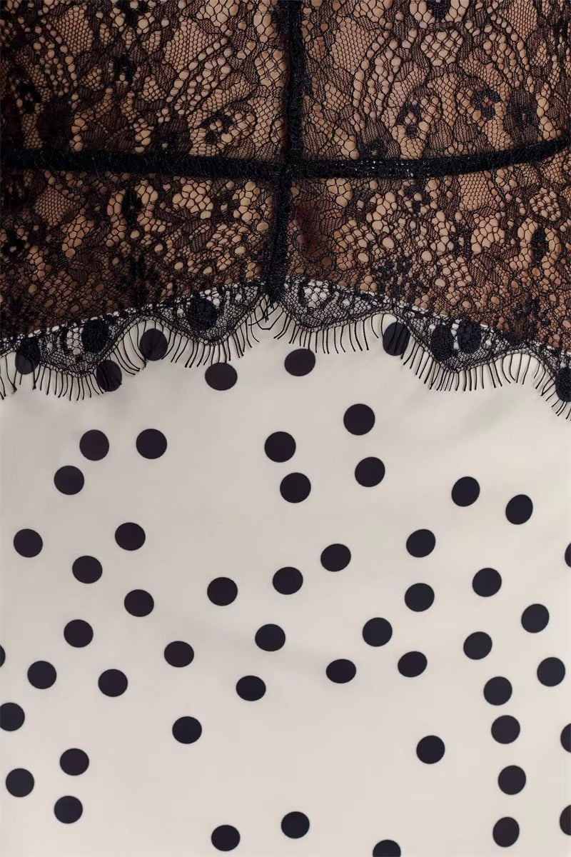 Fashionable women's polka dot halter neck maxi dress with elegant lace. Chic & versatile for summer events.