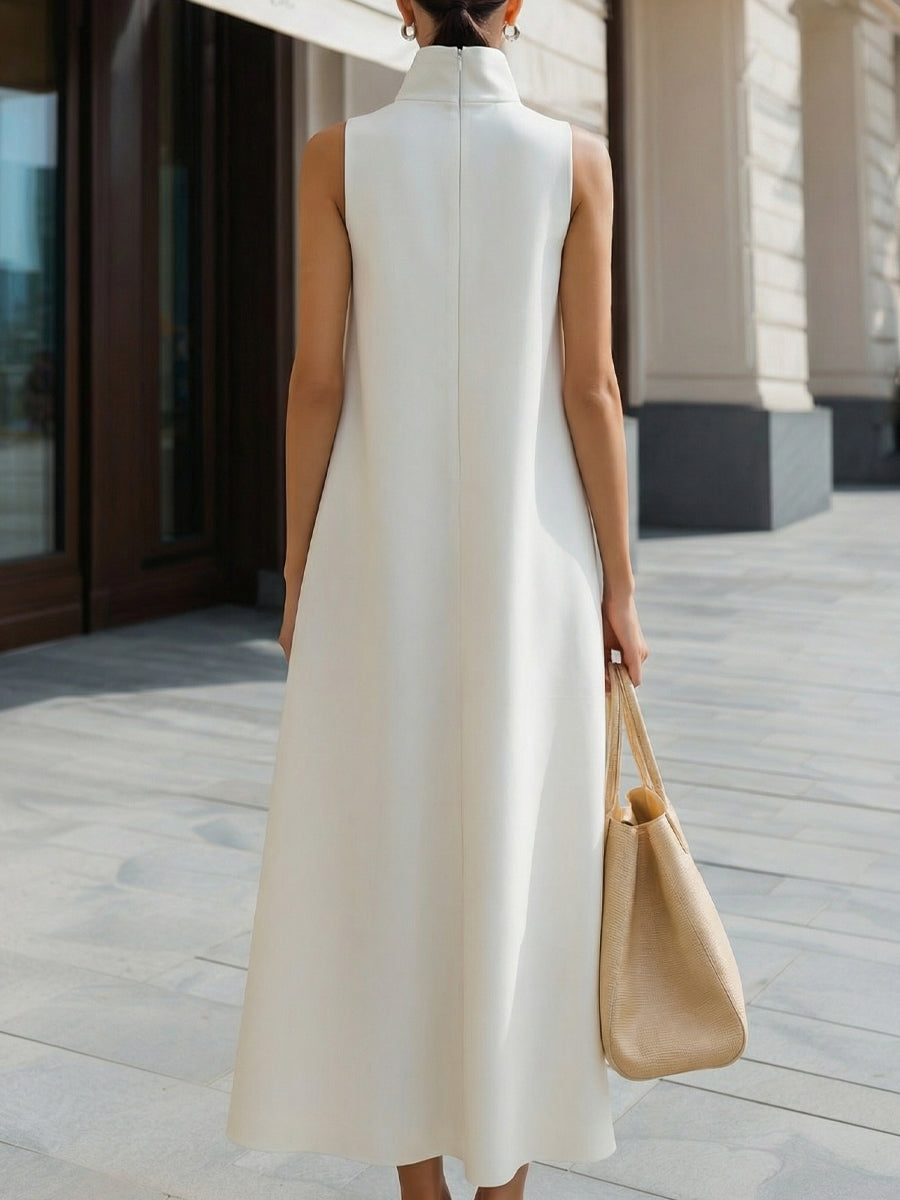Comfortable & elegant sleeveless high-neck white maxi dress for women, ideal for summer evenings & events.