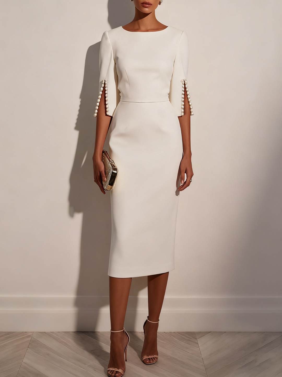 Sophisticated pearl detail midi dress, a stunning choice for wedding guests.