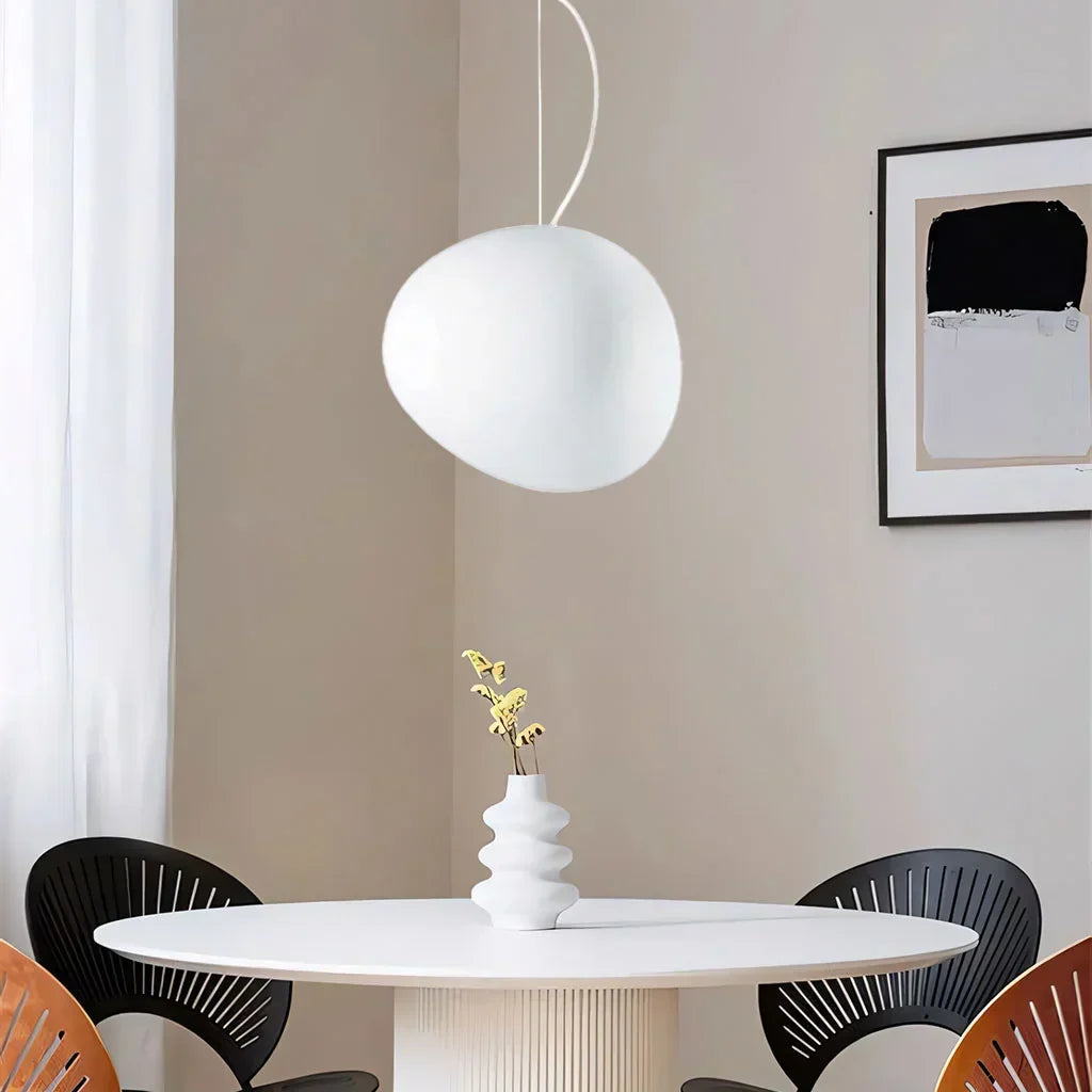 Elegant white pebble pendant light, minimalist modern design. Perfect for contemporary home decor.