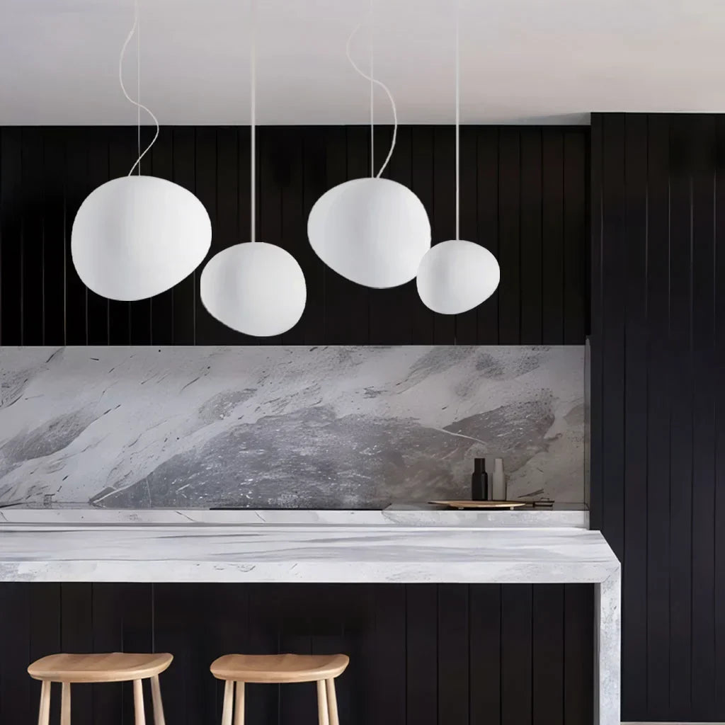 Unique white pebble design pendant light, minimalist modern ceiling lamp for stylish homes.