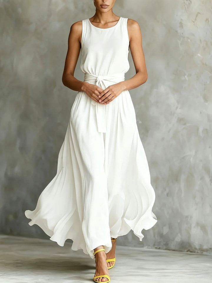 Elegant white sleeveless A-line maxi dress for women, featuring a stylish belt, perfect for summer events.