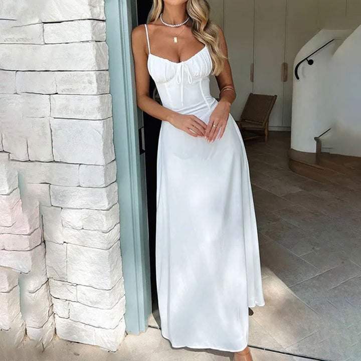 Elegant white sleeveless ruched bodice maxi dress for women, perfect for summer style.