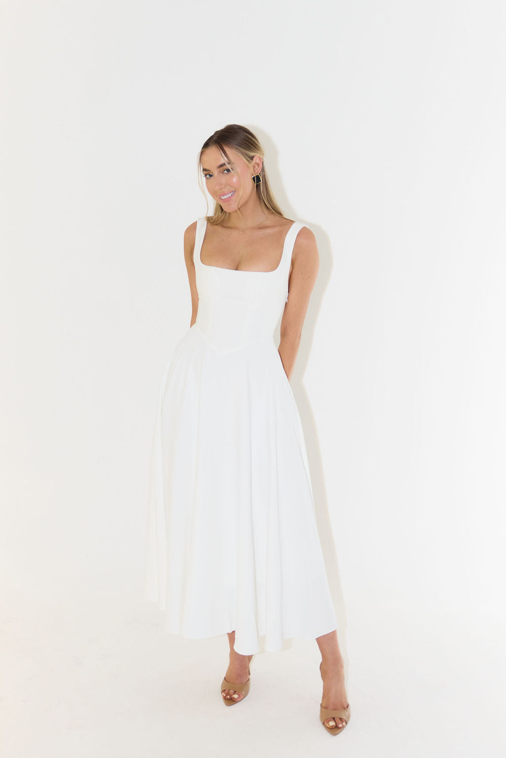 Black women's square neck midi dress, an elegant A-line design ideal for formal occasions & summer style.