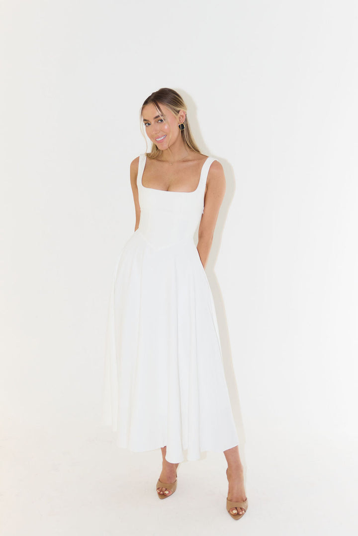 Black women's square neck midi dress, an elegant A-line design ideal for formal occasions & summer style.