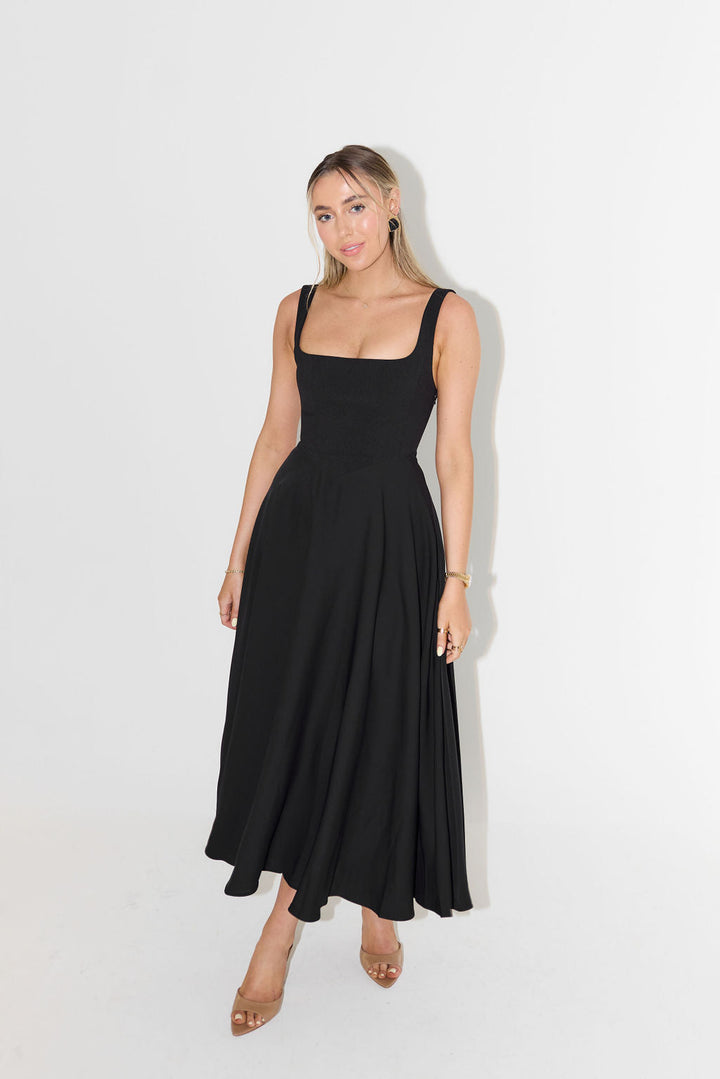 Black elegant square neck midi dress, a stunning women's formal wear choice & versatile occasion dress.