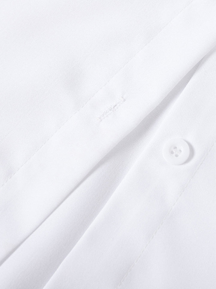 Versatile women's tiered ruffle cuff button up blouse. Elegant, casual, or workwear with chic flare sleeves.