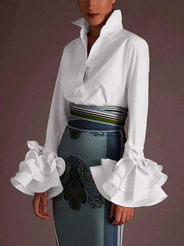 Chic pink women's tiered ruffle cuff button up blouse with elegant flare sleeves. Feminine and stylish top.
