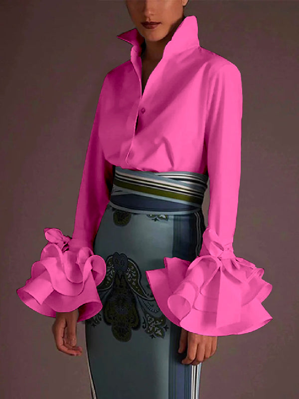 Feminine white tiered ruffle cuff button up blouse for women. A stylish casual top with elegant flare sleeves.