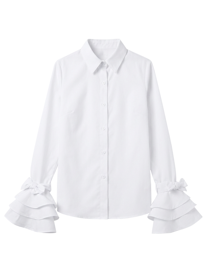 White elegant tiered ruffle cuff button up shirt, a feminine top perfect for any occasion. Stylish blouse.