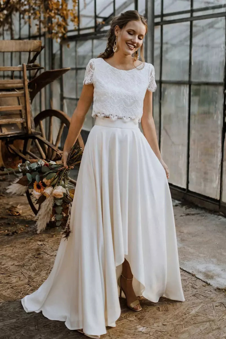 White elegant two-piece maxi skirt & top set, ideal for wedding guests, bridal events, or special occasions.