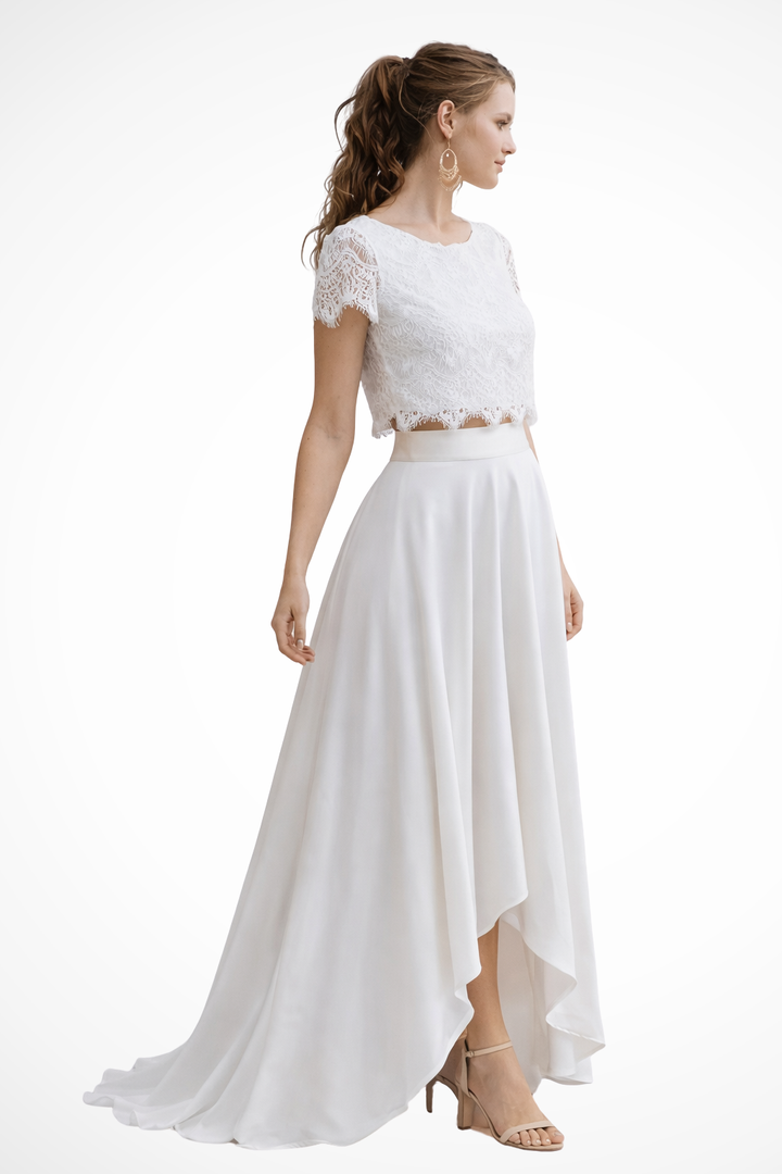 Graceful white two-piece set: elegant top & flowing maxi skirt for women, suitable for bridal or formal wear.