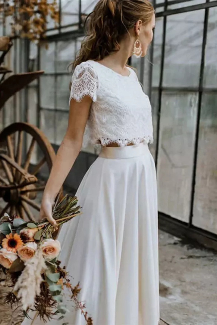 White elegant two-piece top and maxi skirt set for women, a beautiful formal occasion dress.