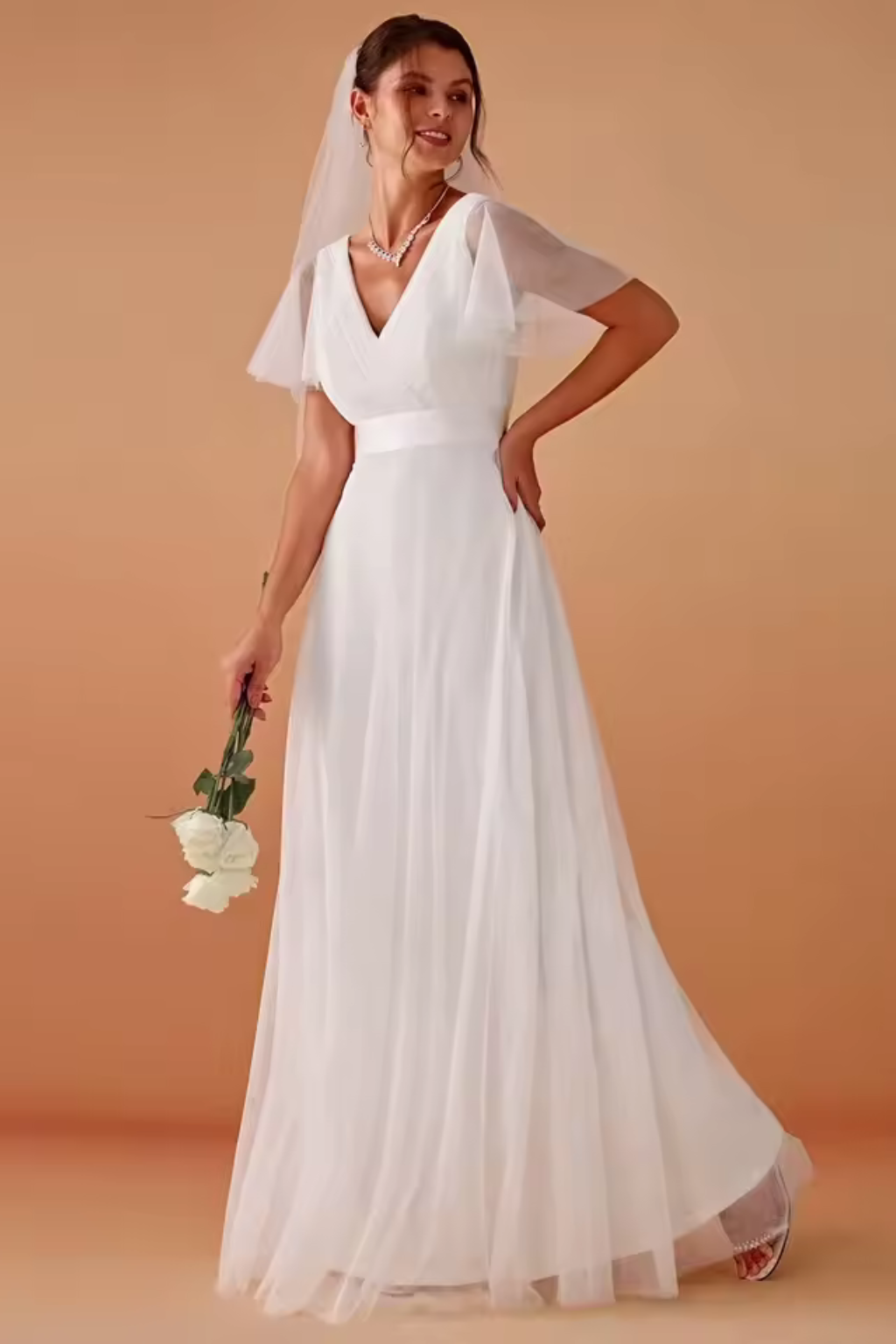 Flowy A-line maxi dress for women with V-neck and delicate flutter sleeves, ideal for semi-formal parties.