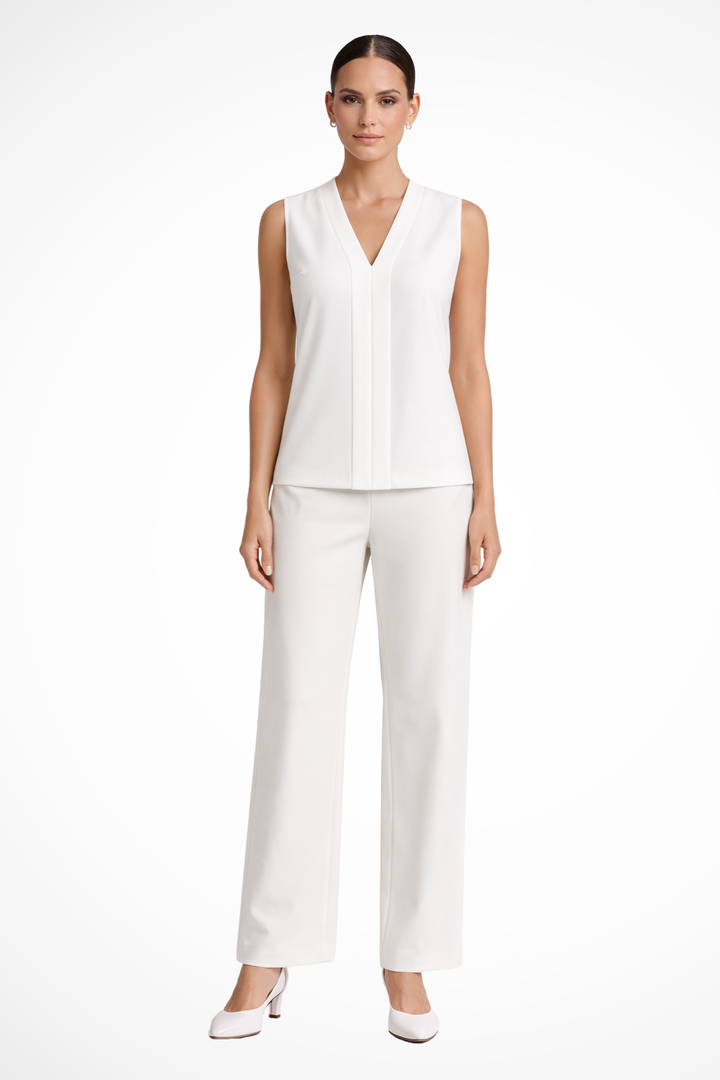 Elegant white V-neck sleeveless blouse for women. Versatile smart casual or workwear top with front pleat detail.