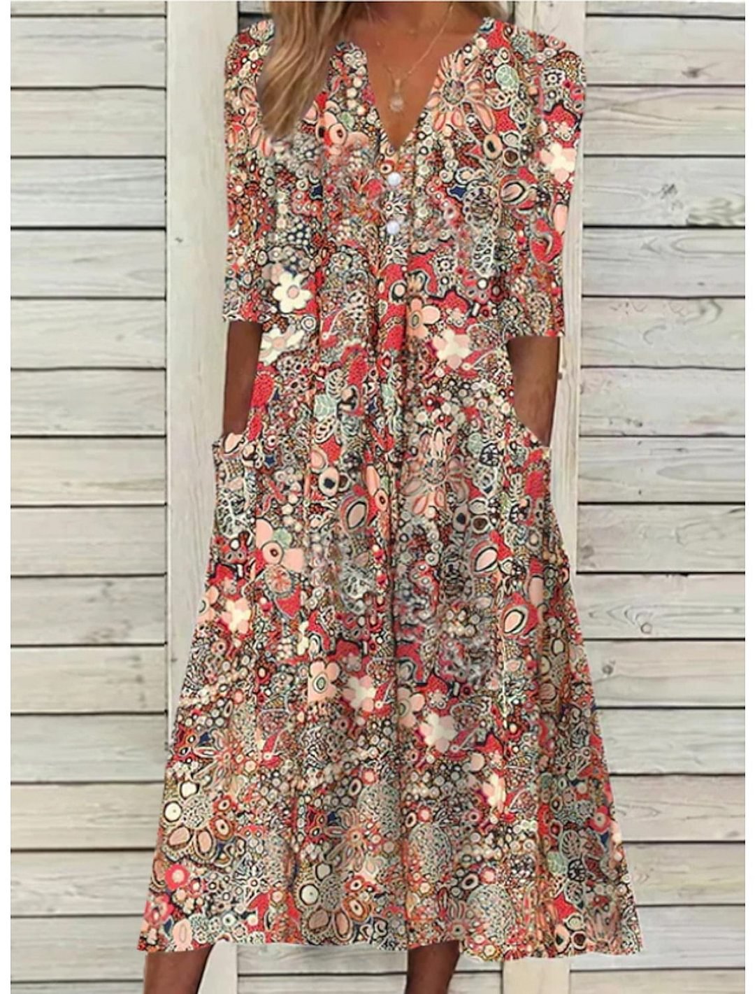 Elegant white V-neck summer dress for women, featuring a flattering and comfortable design.