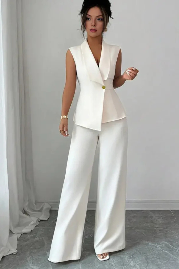 Stylish white women's sleeveless suit set with wide-leg trousers, ideal for summer business casual or events.