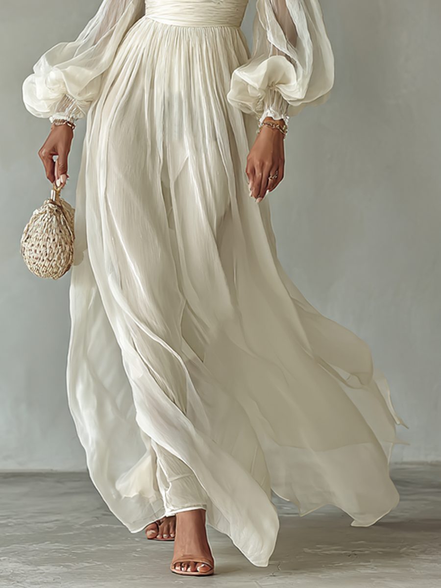 Stylish women's white maxi dress featuring a square neck and long sleeves. Ideal for elegant spring fashion.