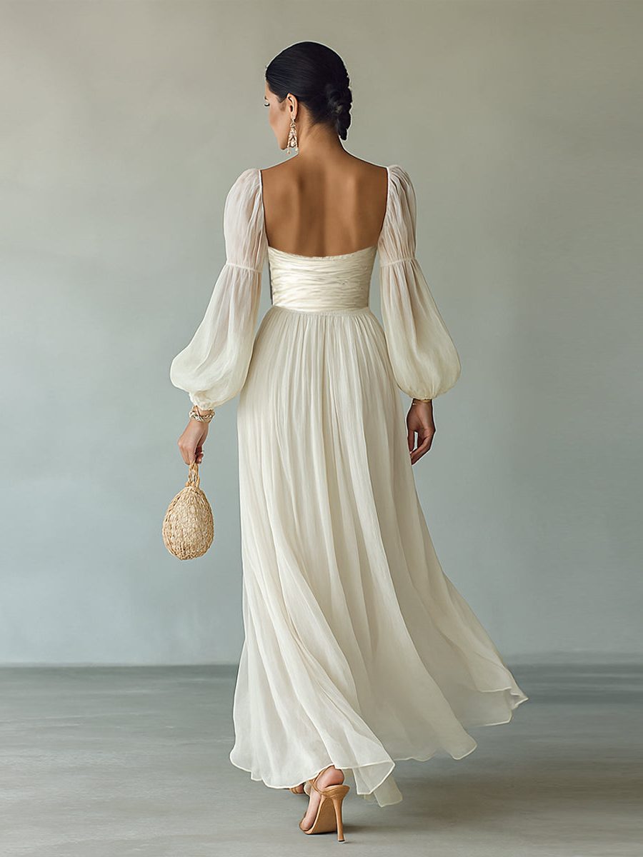 Women's elegant white maxi dress with square neck & long sleeves. Flowy design for comfortable spring/summer style.
