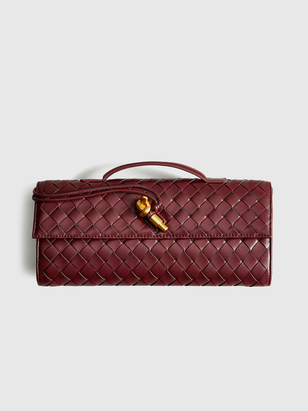 Elegant wine red woven flap clutch & shoulder bag for women. Versatile day-to-night purse with magnetic closure.
