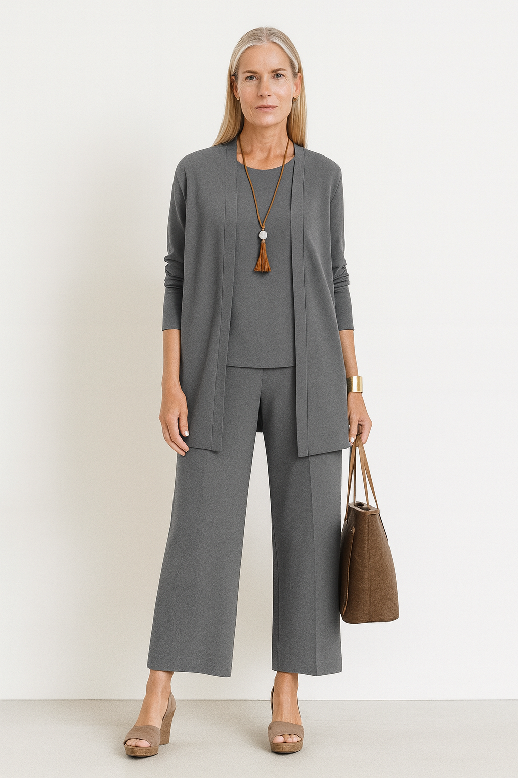 Elegant women's 3-piece set: jacket, waistcoat & tailored pants. Perfect for business casual style.