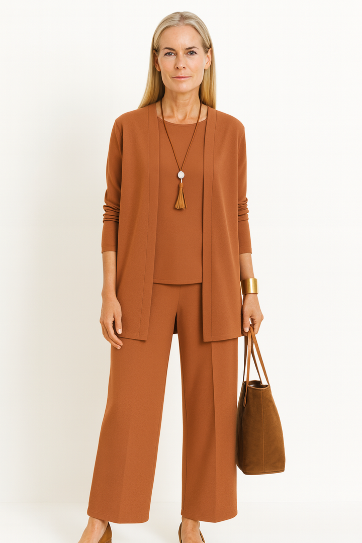 Elegant women's jacket, waistcoat, and pants 3-piece set. Tailored for versatile business casual style.