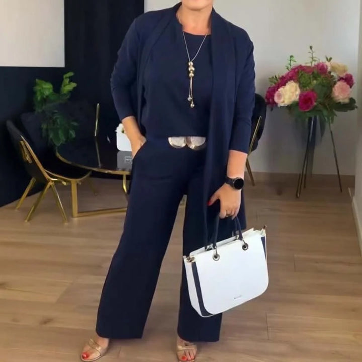 Stylish women's matching knit outfit: soft cardigan, cami, and elegant wide-leg pants for any occasion.