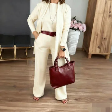 Comfortable women's 3-piece set featuring a cozy cardigan, matching camisole, & modern wide-leg trousers.