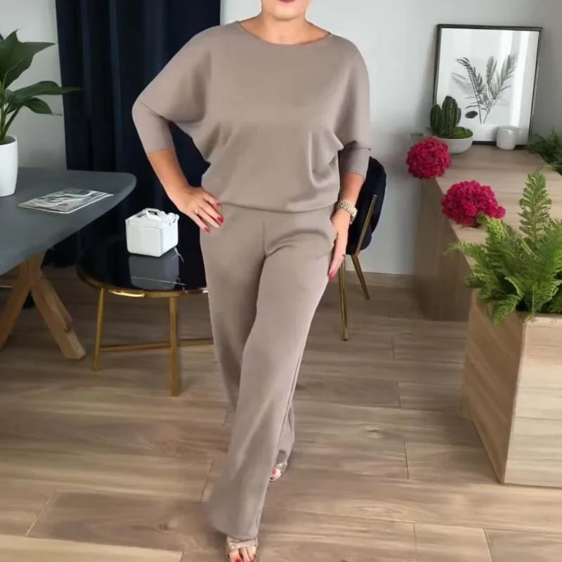 Women's elegant 3-piece set: sophisticated cardigan, coordinating cami, and flowy wide-leg pants outfit.