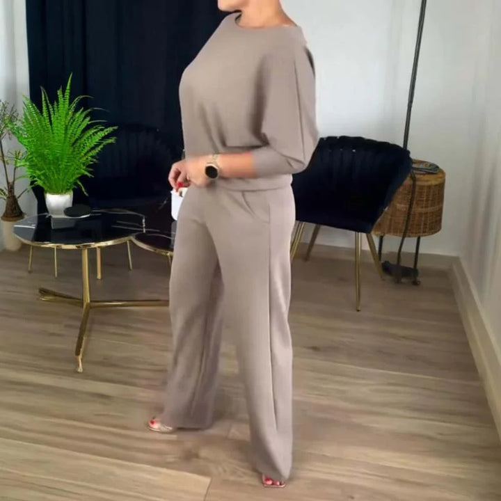 Trendy women's 3-piece set with stylish wide-leg pants, a matching cami, and a chic duster cardigan.