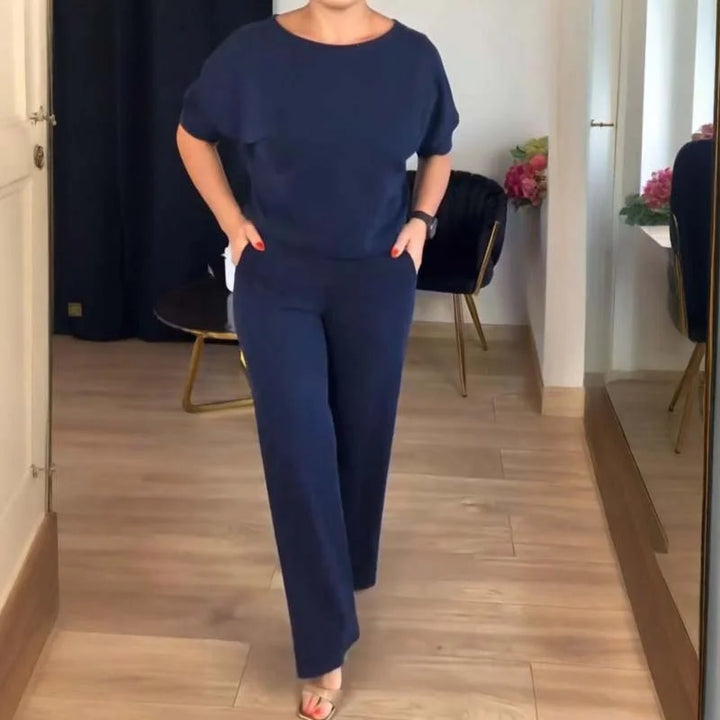 Modern women's 3-piece knit set: elegant cardigan, camisole, and comfortable wide-leg lounge pants.