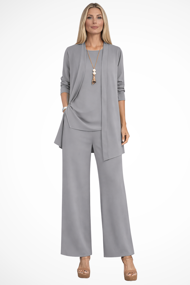 Casual chic women's 3-piece set: sleeveless blouse, smart jacket & flowing wide-leg pants for a modern look.