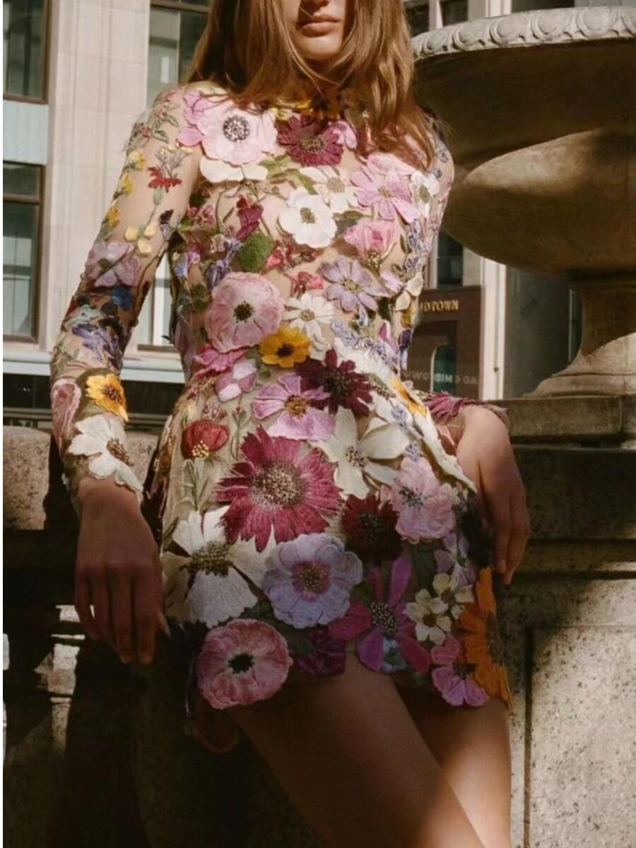 Stunning pink floral embroidered dress featuring 3D details, ideal for elegant events and evening wear.