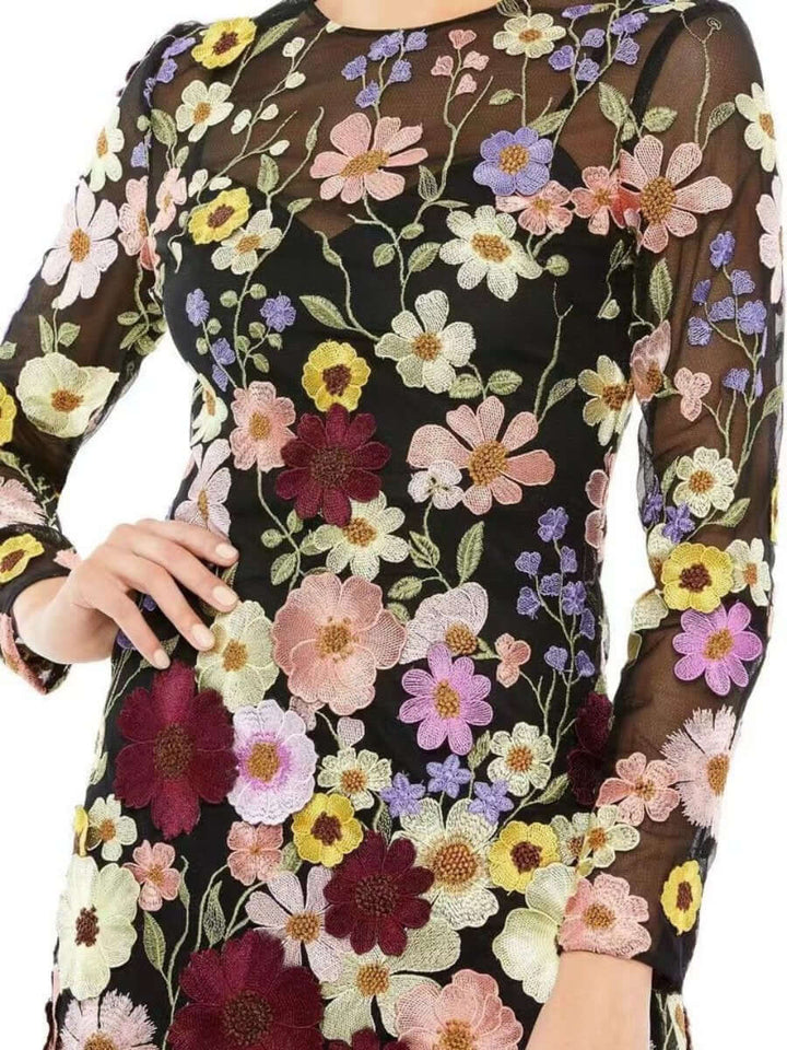 Sophisticated women's embroidered dress with delicate floral patterns, suitable for any elegant occasion.