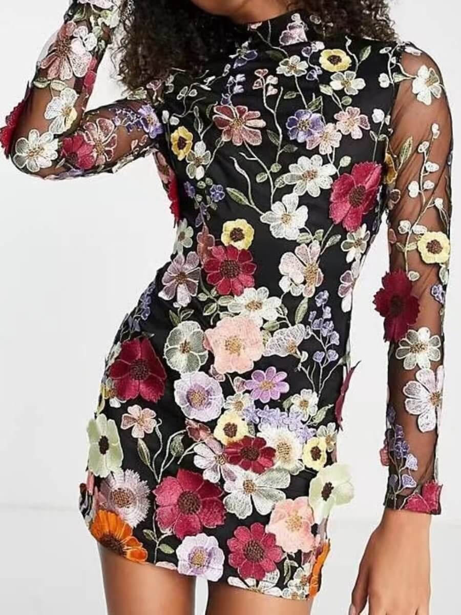 Beautiful women's floral embroidered dress in a flattering silhouette, offering an elegant all-season style.