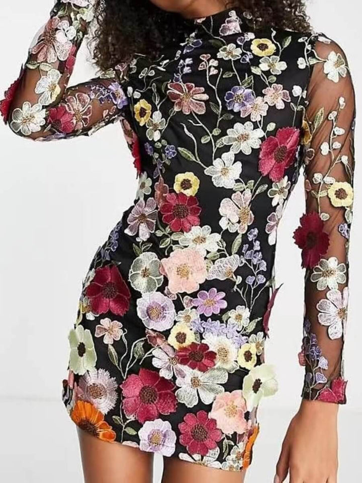 Beautiful women's floral embroidered dress in a flattering silhouette, offering an elegant all-season style.