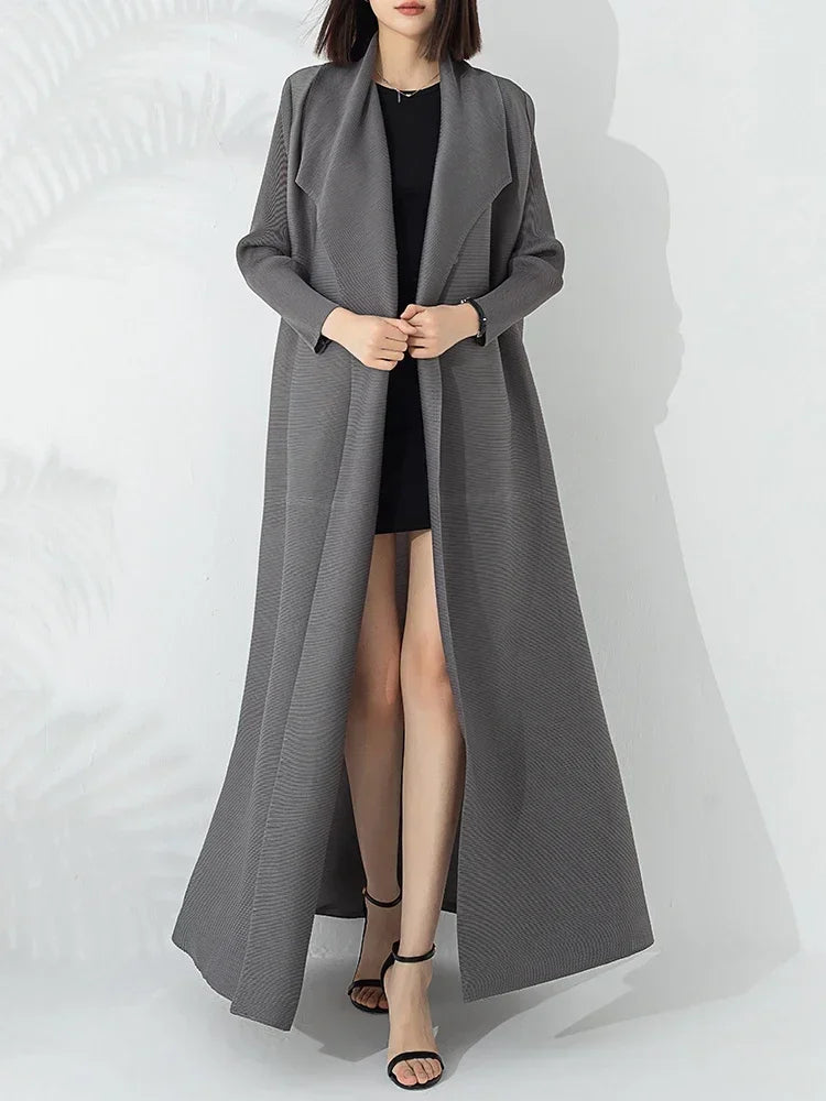 Sophisticated women's long belted A-line coat, featuring a high funnel neck for classic cold-weather style.