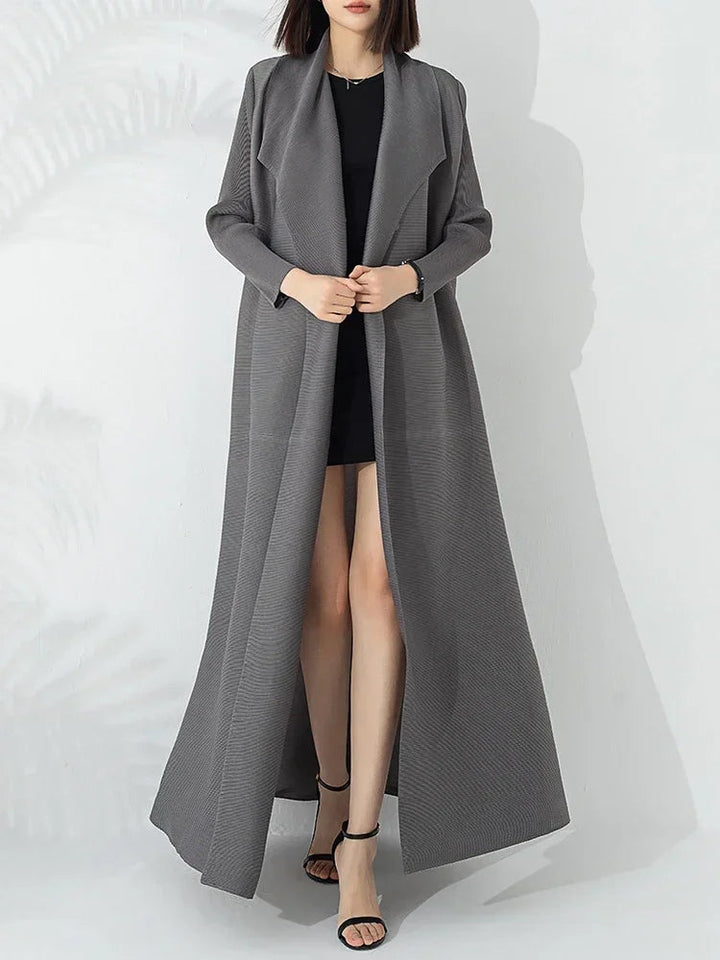 Sophisticated women's long belted A-line coat, featuring a high funnel neck for classic cold-weather style.