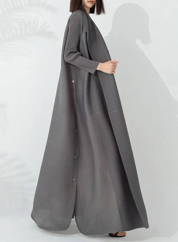 Chic women's funnel neck A-line coat, cinched with an elegant belt. Ideal for modern fall and winter fashion.