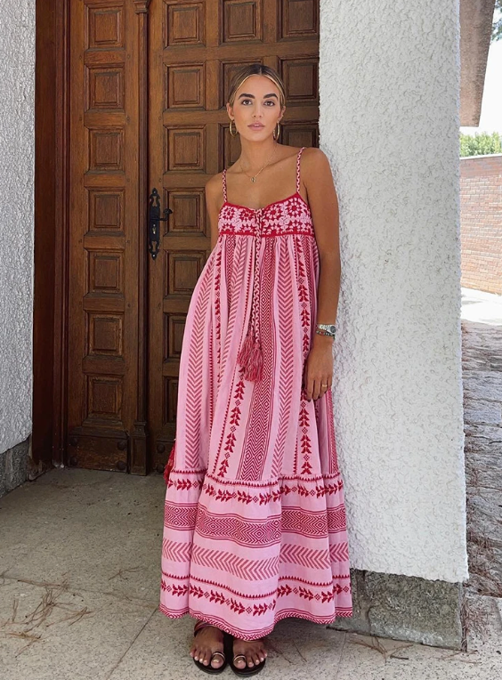 Elegant women's A-line maxi dress with flowing silhouette, perfect for evening wear & special occasions.