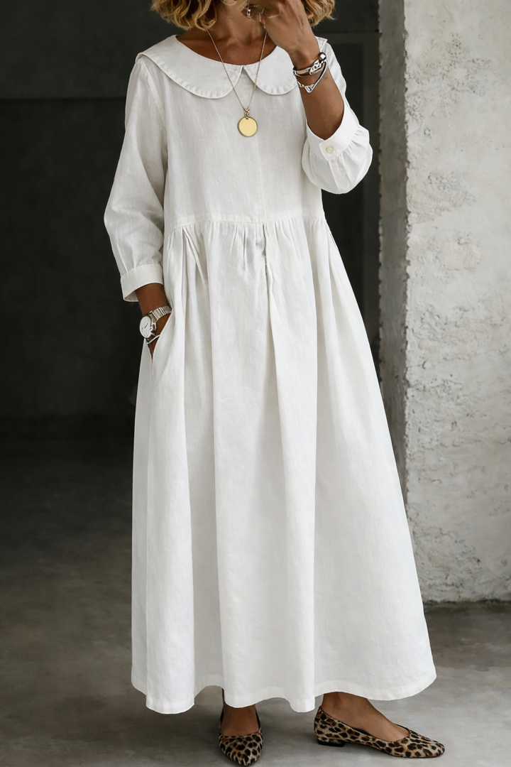 Loose-fit women's long sleeve maxi dress with a charming Peter Pan collar. A comfortable and stylish casual a-line dress.