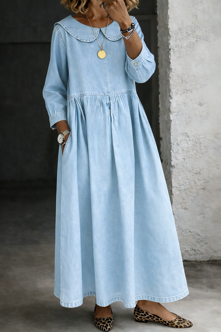Stylish women's Peter Pan collar A-line maxi dress. Long sleeves & loose fit offer comfort and a sophisticated casual style.