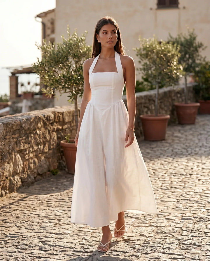 Glamorous women's A-line maxi dress with halter top & corset waist. Perfect formal wear for any event.