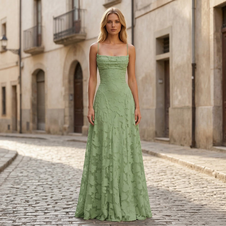 Elegant women's a-line maxi formal gown with delicate spaghetti straps.