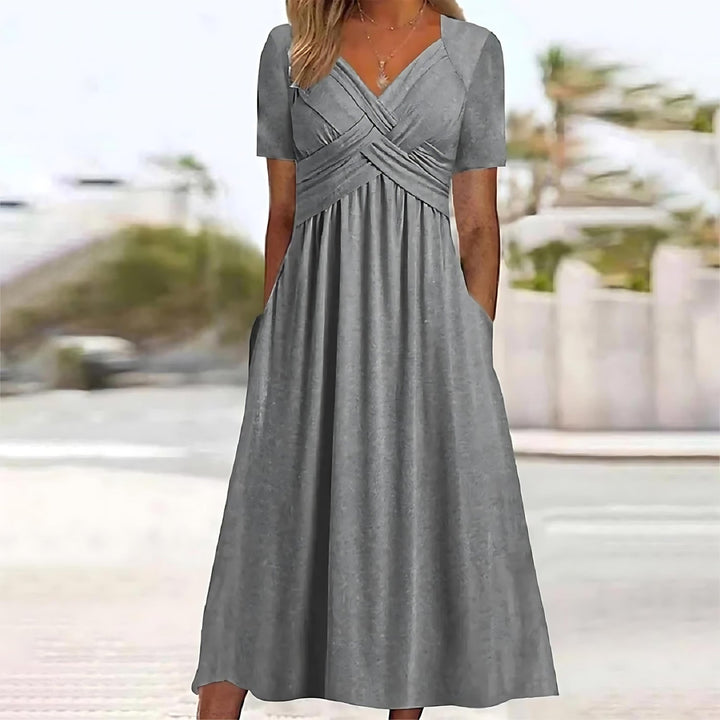 Graceful A-line midi dress, women's classic style, elegant and flattering for any occasion. Smooth fabric, chic.