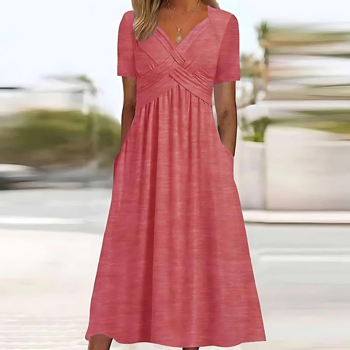 Chic women's summer A-line midi dress, elegant and flattering, perfect for warm weather occasion wear or casual elegance.